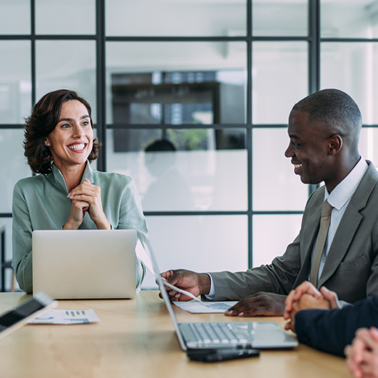 Business professionals in a meeting at a table